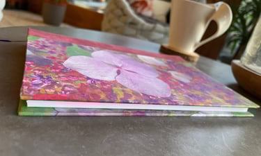 a flowered notebook on a table