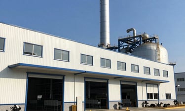 brown and white concrete building under blue sky during daytime