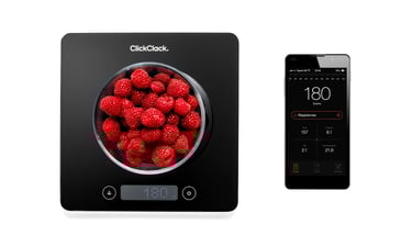 Product photography - a bowl of raspberries on a scale