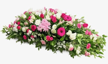 Elegant casket spray floral arrangement with pink and white roses, gerberas, and carnations for funeral services.