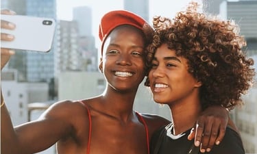 Black Lesbian couple taking a selfie