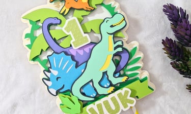 Cake topper with three dinosaurs. Vibrant.