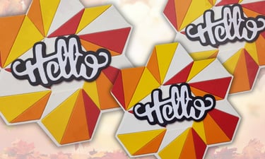 Irregular shaped card saying "Hello" in bright red, yellow and orange colors.