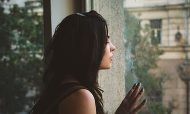woman feeling anxious and overwhelmed at home