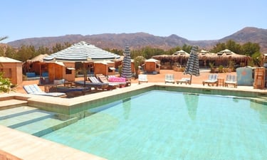 Beachfront pool and restaurant at Bedouin Star Ras Shitan Nuweiba
