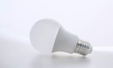 A LED lightbulb an energy saving alternative to a regular lightbulb.