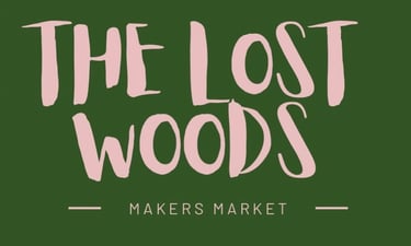 The lost woods market logo