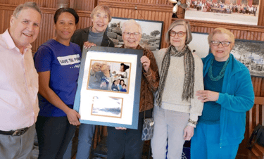 Service League presents award from Chicago Commons to HP Historical Society for Archives