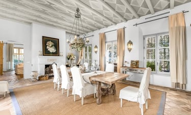 Elegant dining room with rustic beams at Finca Santa Katerina