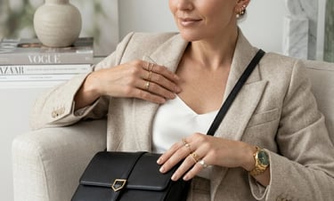 Fashion expert styling layered knuckle rings with trendy modern accessories