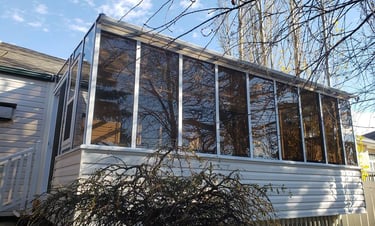 Solarium with tinted, double-glazed acrylic panels..