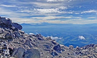 The volcanoes Malinche and Pico de Orizaba on the Distant Horizon, seen from Iztacchuatl, Mexico