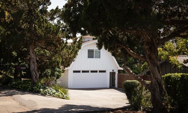 a garage with a garage door and a garage door