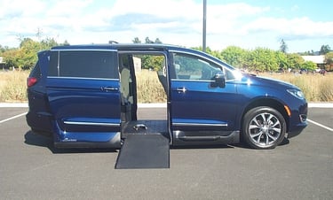 Chrysler Pacifica with the VMI Northstar In-Floor Ramp and the Q'straint QLK 150 Docking System  