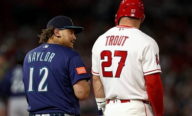 Apr 3: Josh Naylor (left) and Mike Trout (right) talk during the game at Angel Stadium of Anaheim in Anaheim, California. 