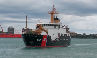 Black and white U.S. Coast Guard cutter approaching the dock in Port Huron.