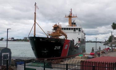Black and white U.S. Coast Guard cutter docking in Port Huron.