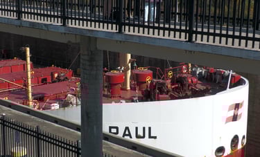 The bow of ship Baie St. Paul underneath the observation platform at Lock 3.