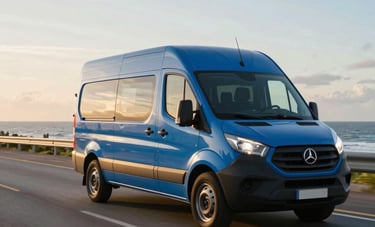 A modern medium blue delivery van driving along a wide coastal avenue in Brazil during the golden hour. The composition shows the van in motion, conveying speed and reliability. The style is professional commercial photography.