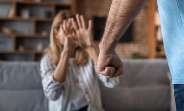 Domestic violence protection orders concept, woman raising hands to defend herself against aggressive partner in a home, repr