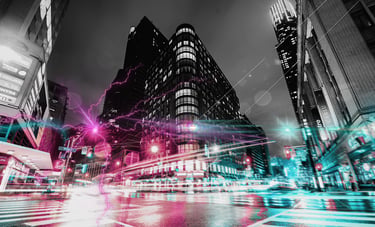 Toronto at night in a black and white photo with neon bursts coming from it for Helena's new LitRPG