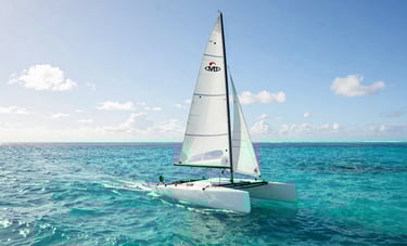 Professional photography of a white catamaran sailing on the crystal clear turquoise waters of a South Pacific lagoon. The water is shimmering under the afternoon sun, light blue sky with few white clouds. Clean, crisp, and high-quality composition.