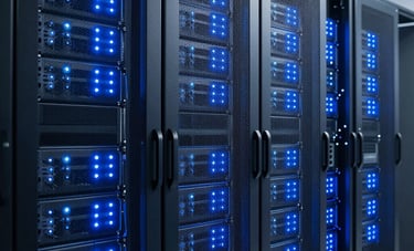 A sophisticated technology server room in North America with rows of modern server racks. The lighting is dominated by pale blue and navy blue glowing indicators, conveying innovation, high performance, and high-level security.