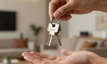 Close-up of a set of keys being handed over, with a blurred background of a modern South American living room, warm and professional lighting.
