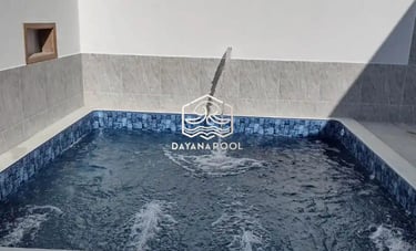 kolam renang buatan dayanapool di abndung dengan finishing batu alam sukabumi hijau