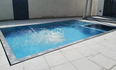kolam renang buatan dayanapool di abndung dengan finishing batu alam sukabumi hijau