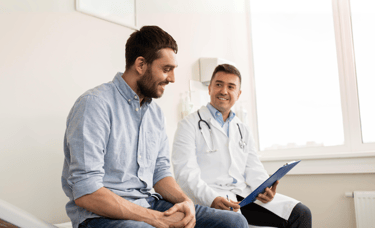 a man in a doctor's office for a primary care visit