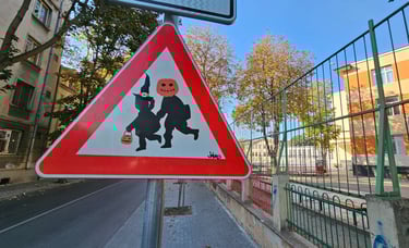 a street sign with a cartoon character on it