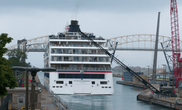 The stern of cruise ship Hanseatic Inspiration, as she exits the MacArthur Lock.