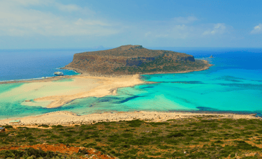 a beach with a boat in the water