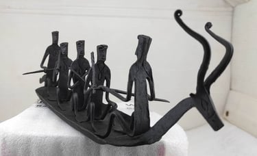 "Handmade Bastar tribal iron boat showing 5 figures – right side angle for decor display-Export-oriented"