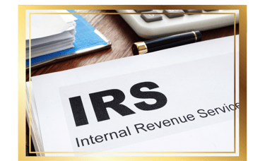 a paper on the desk with IRS logo