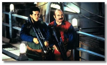 Filme Super Mario Bros 1993, irmãos Mario e o Rei Koopa usando a Bazuca Super Scope