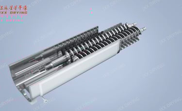 Close-up view inside a paddle dryer, showcasing the installed wedge-blade desig