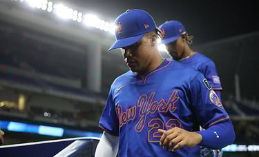 April 1 NY Mets Juan Soto (22) and Francisco Lindor enter the dugout in between innings during a game vs. Marlins