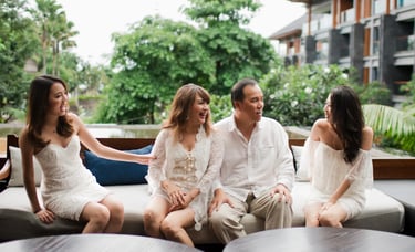 Janice family sharing a relaxed moment during a lifestyle photography session at Indigo Seminyak Bali
