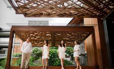 Janice family standing at the villa entrance during a family photography session at Indigo Seminyak Bali