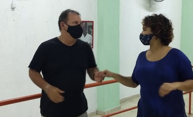 a man and woman in masks and masks