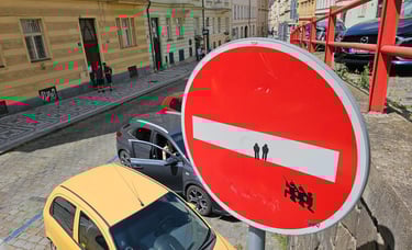 a red and white sign with a red and white sign that says no parking