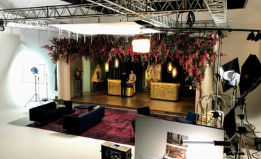 A production set recreating a Regent Lobby Lounge with 24 Productions