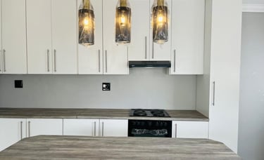 a kitchen with a stove top oven and a stove top oven