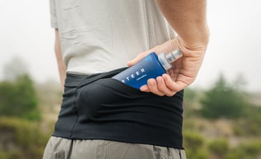 Sporteer running belt product photo with water bottle by BrandNests business marketing team.
