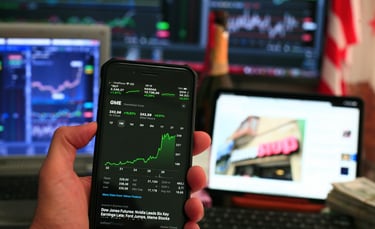 phone showing investing chart symbolizing market volatility