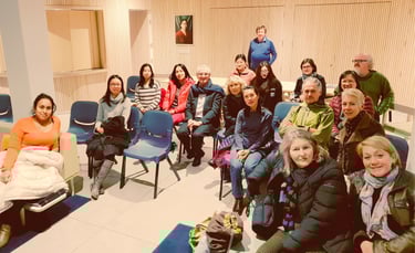 Group of attendees at Auckland International Film Club participating in a post-screening discussion.