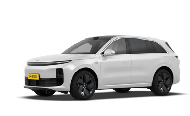 a white suv with a black rim and a yellow license plate