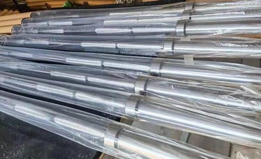 Finished barbells packaged for bulk shipment and wholesale distribution